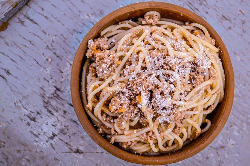 Spaghetti Bolognese with rich meat sauce and parmesan